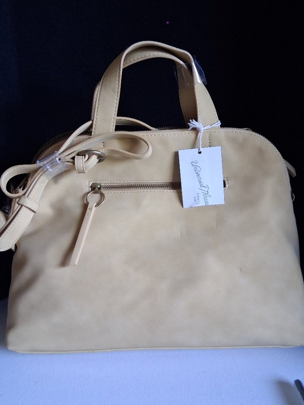 Universal. Threat Yellow Dome shaped satchel. Handbag. Faux leather Soft textu